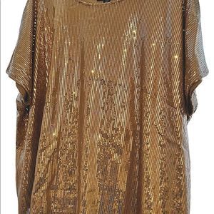 Roman’s champagne colored sequins top.